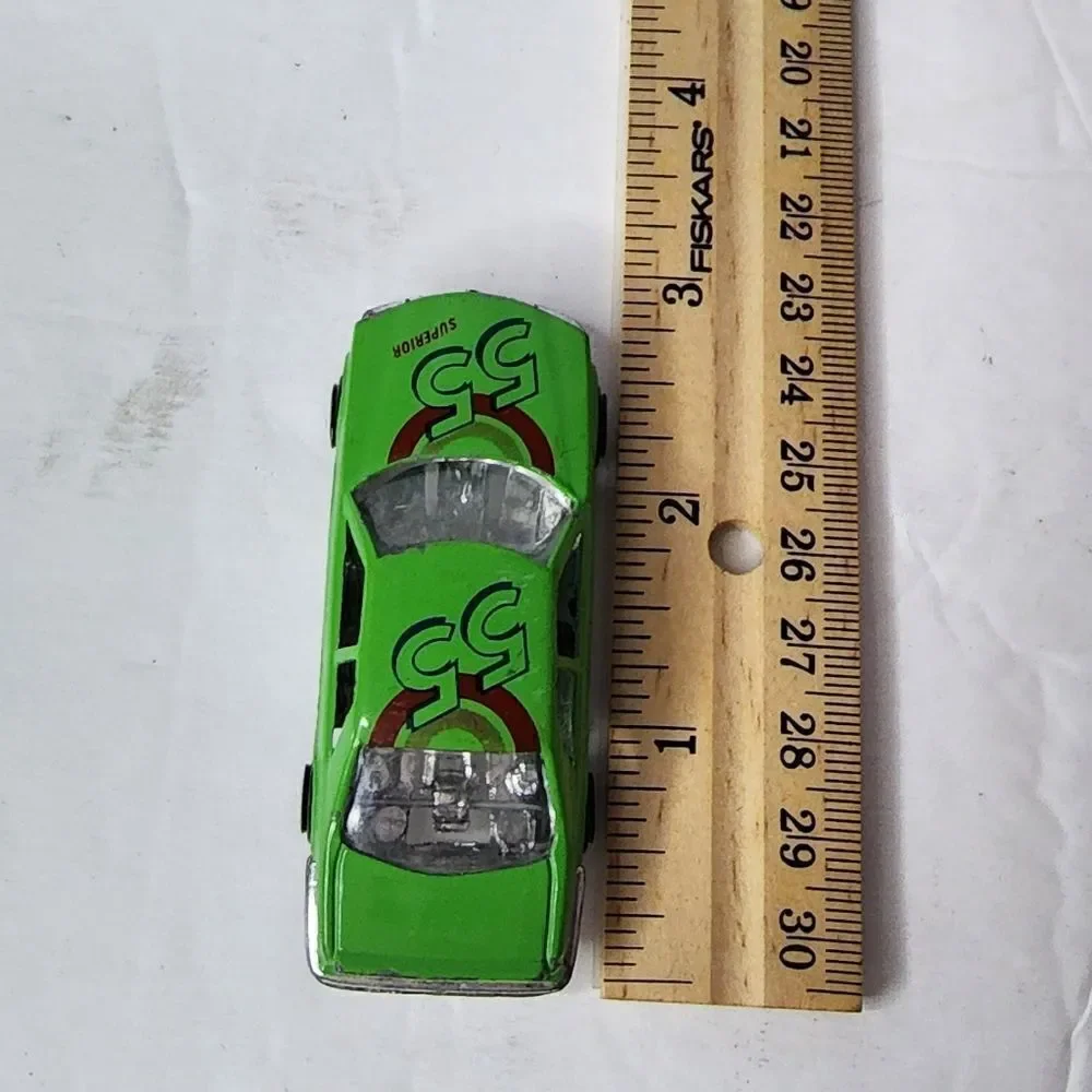 MERCEDES-BENZ 500 SEC  number 8803 can be found on inside Green Race Car #55